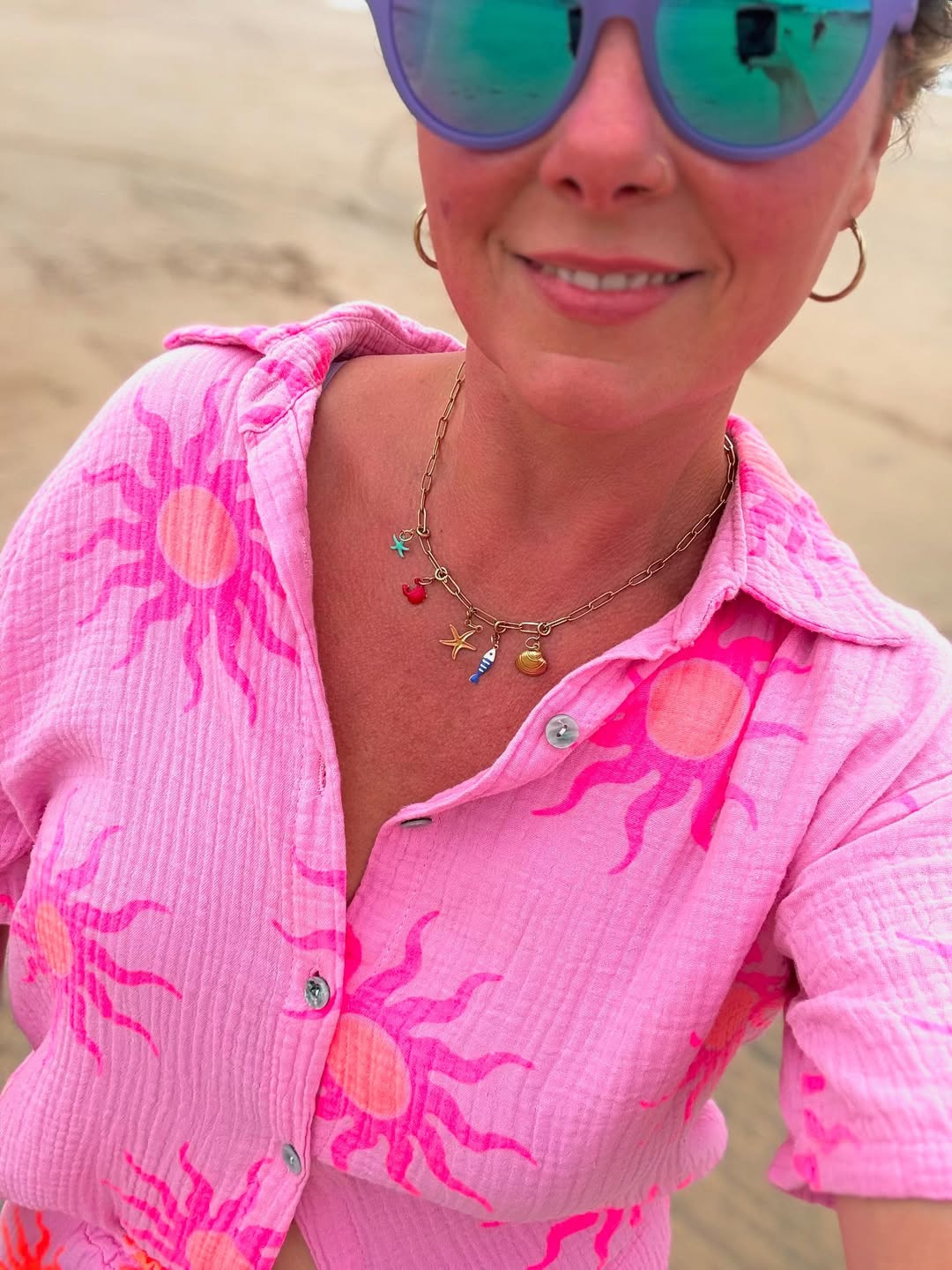 Gold sea charm necklace