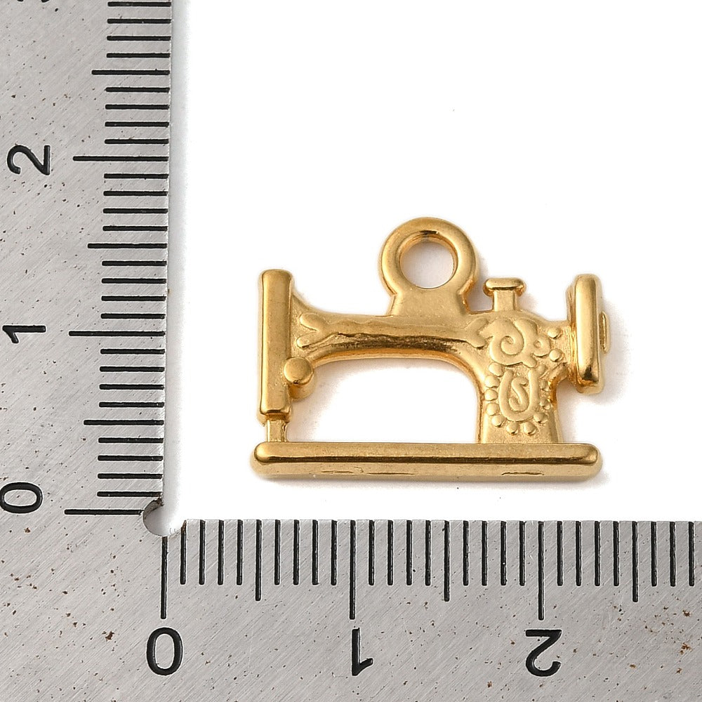 Gold sewing machine charm