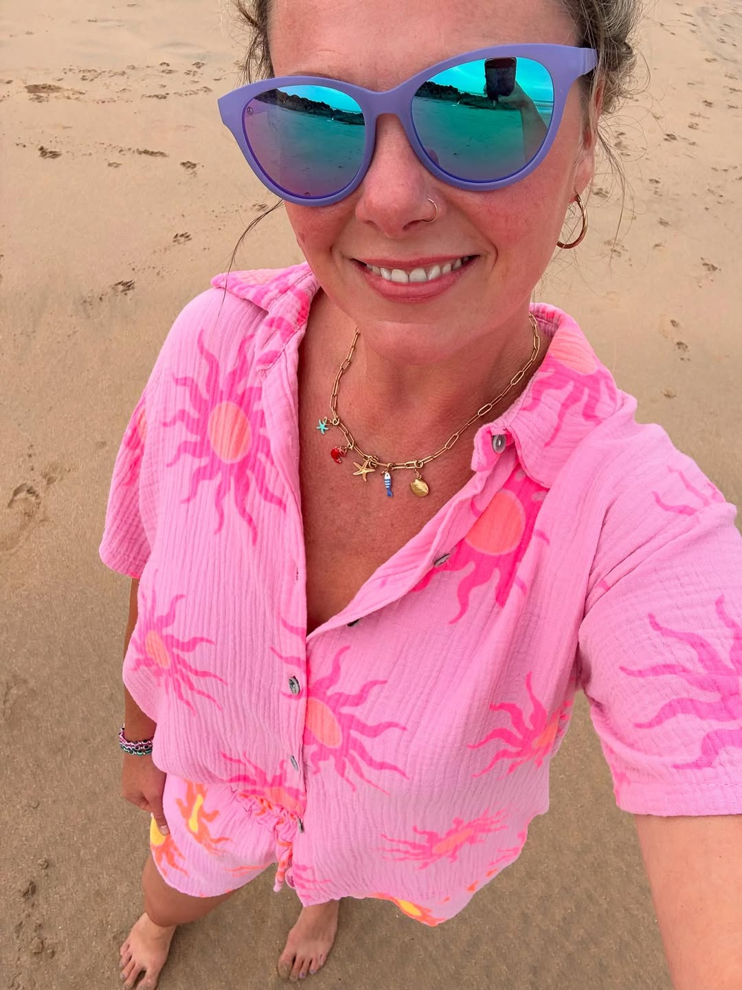 Gold sea charm necklace