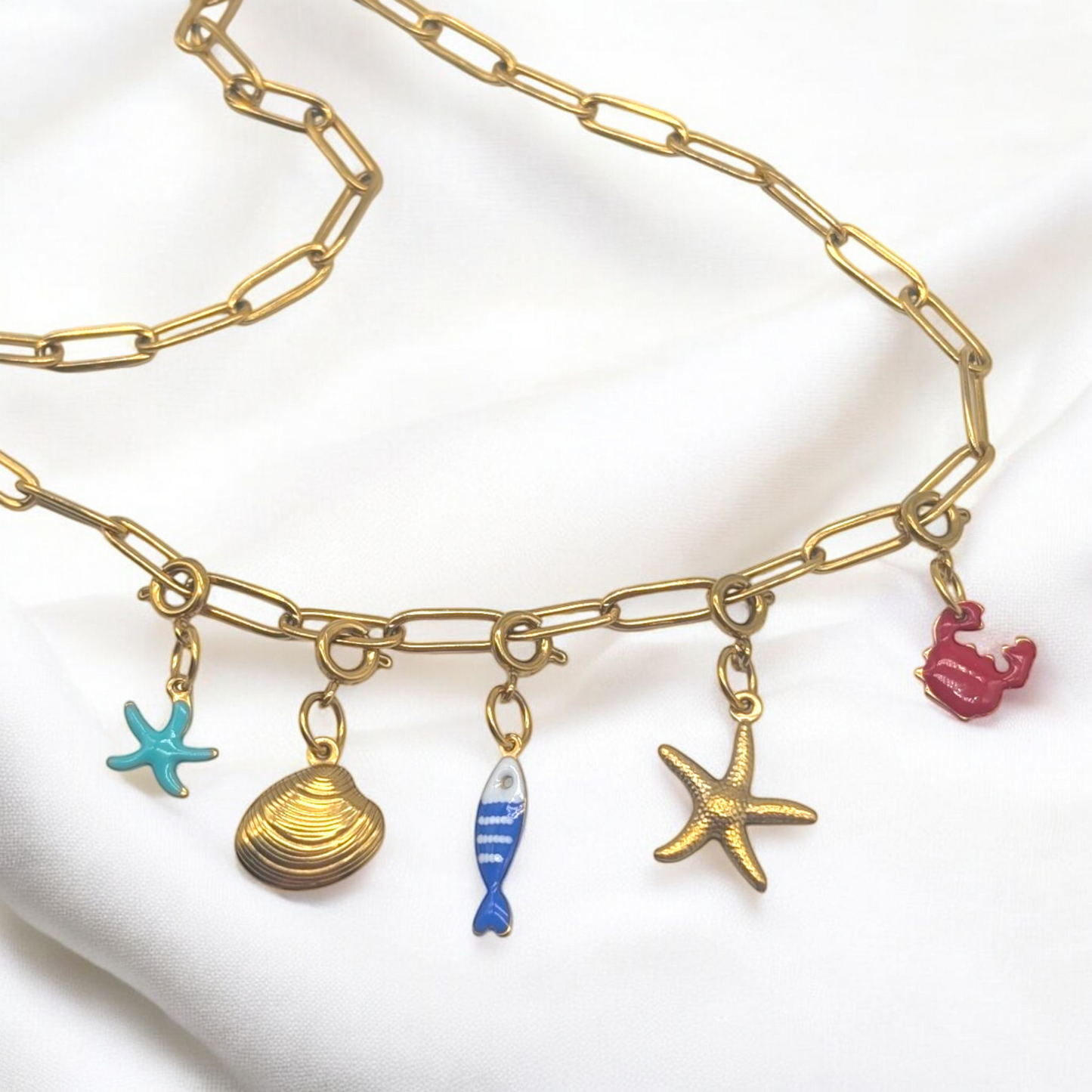 Gold sea charm necklace
