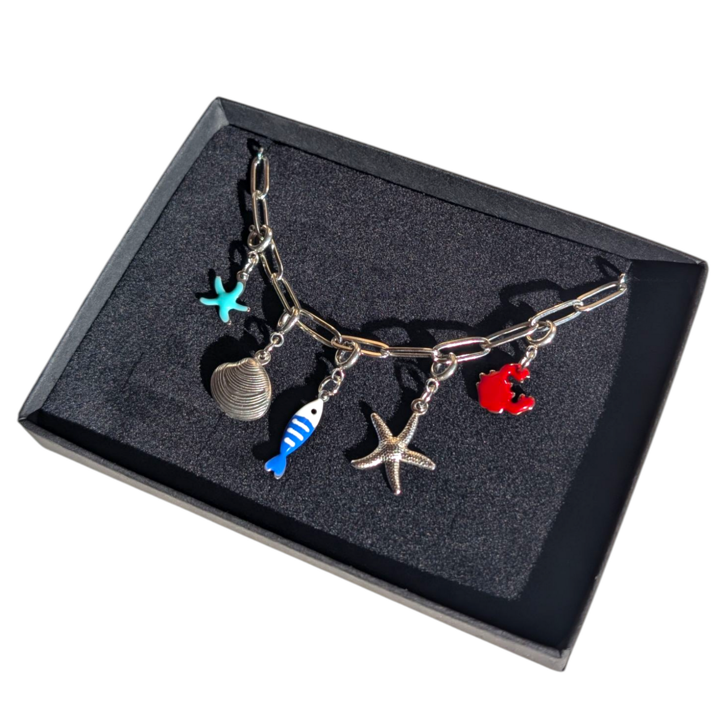 Silver sea charm necklace