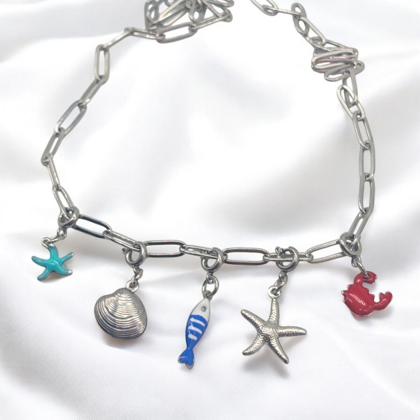 Silver sea charm necklace