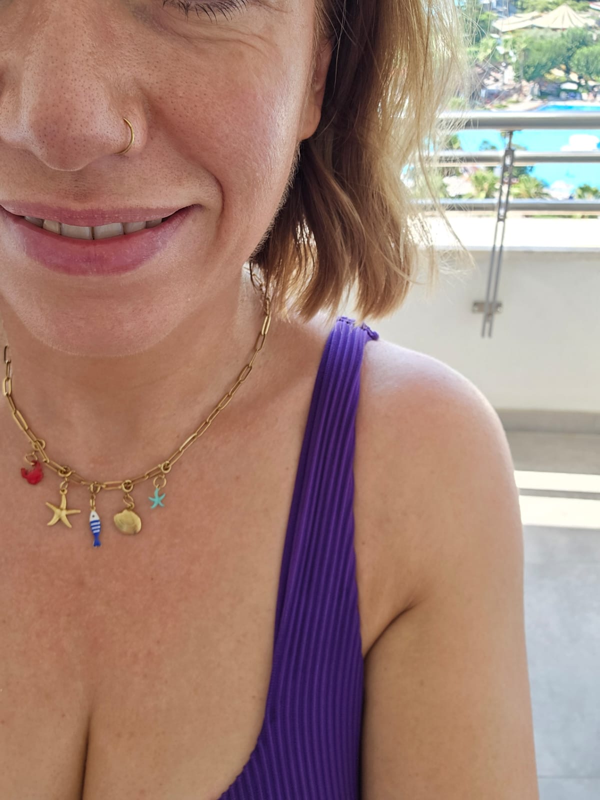 Gold sea charm necklace