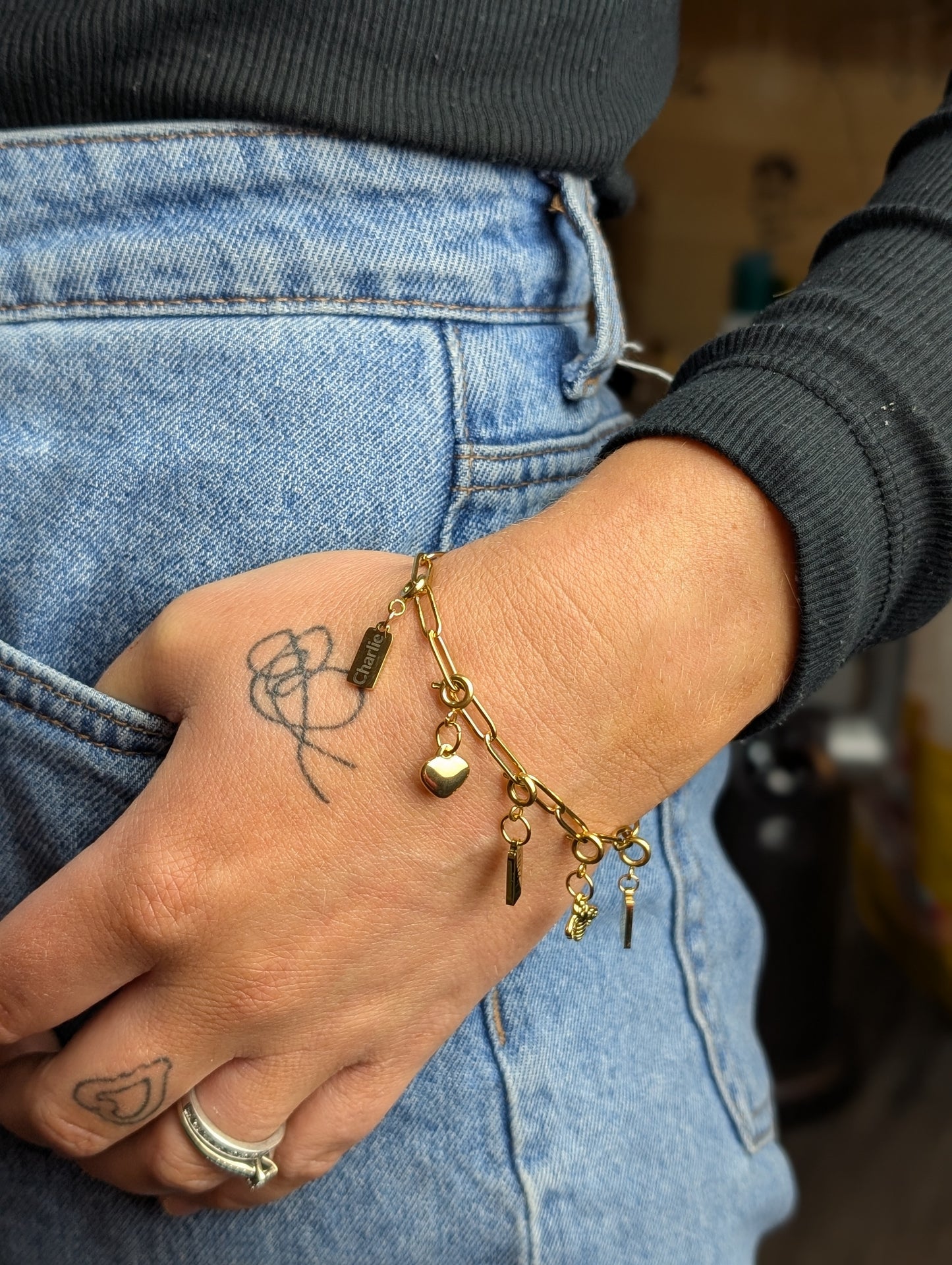 Silver paperclip charm bracelet